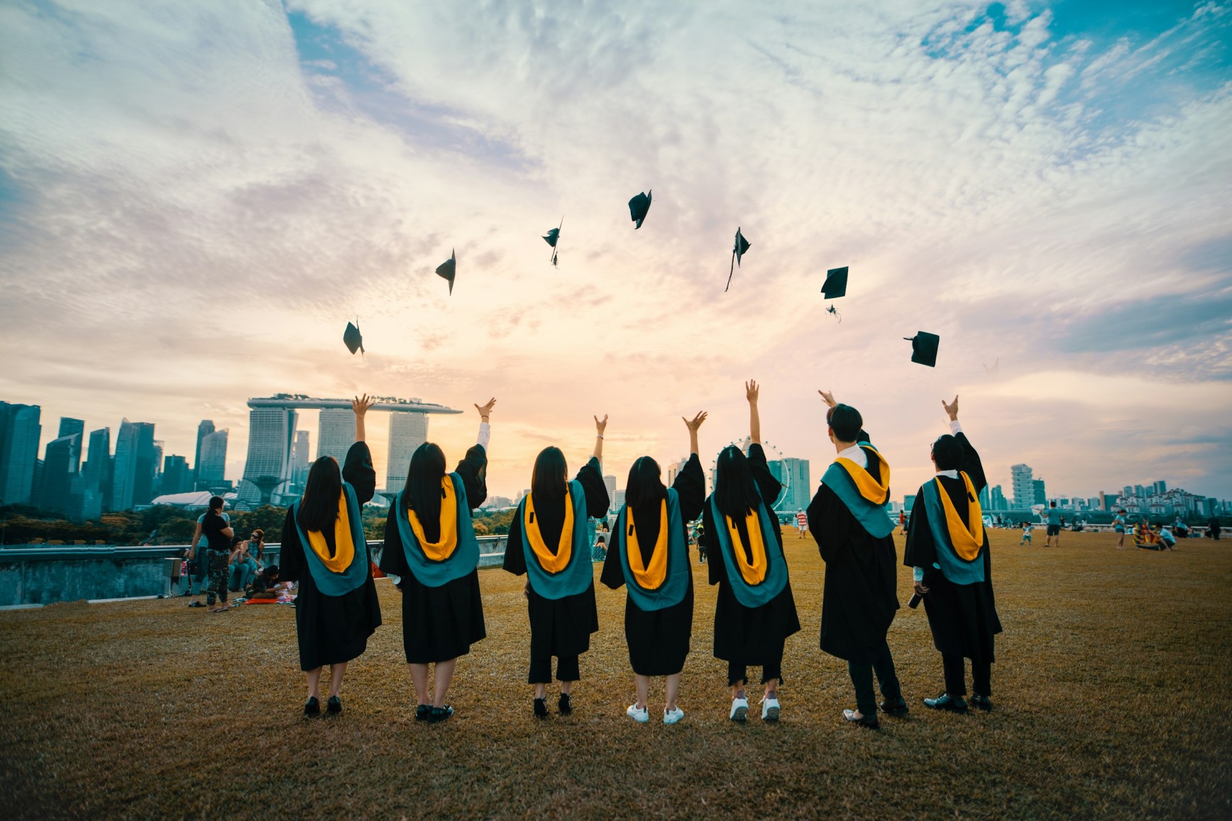 Scholarship graduates celebrating